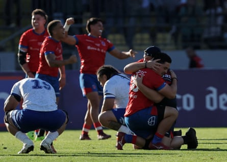 Chile’s players celebrate qualifying for the World Cup by beating Samoa