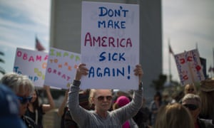 People protest Trump administration policies that threaten the Affordable Care Act, Medicare and Medicaid on 25 January 2017 in Los Angeles, California.