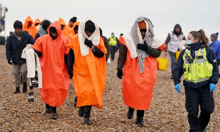 Migrants rescued in the Channel by the RNLI being brought in at Dungeness, Kent, December 2022.
