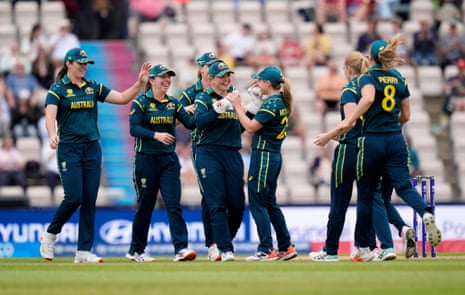 Australia’s stand-in wicketkeeper Georgia Voll (centre) is congratulated by her teammates after taking the catch to dismiss Phebe Molkenboer of the Netherlands.