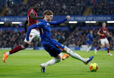Cole Palmer stretches a leg ahead of El Hadji Malick Diouf.