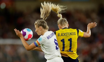 Leah Williamson contests a header with Sweden’s Stina Blackstenius, an Arsenal teammate.