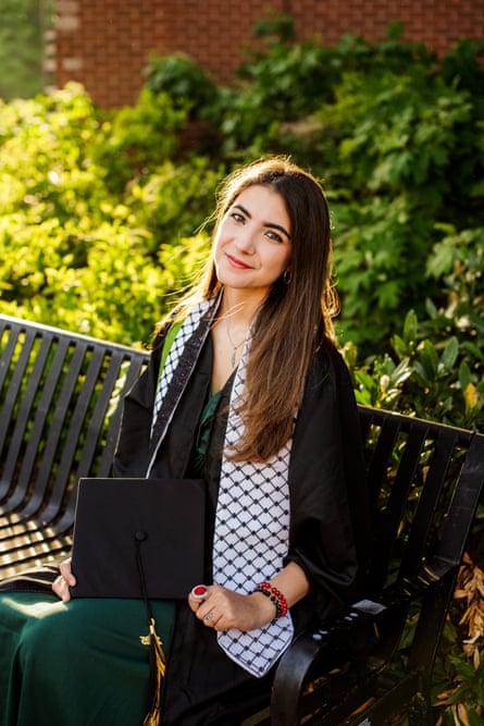 a woman sitting on a bench