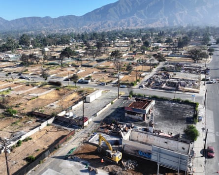 A photograph of houses destroyed by wildfire in the LA districts of Eaton and Palisades