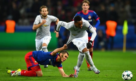Viktor Vasin of CSKA Moscow attempts to stop Anthony Martial of Manchester United by fair means or foul.