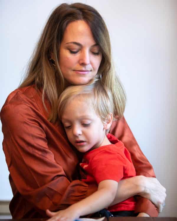 Elle Cavatore with her youngest son, Thomas, at their home in Houston, Texas.