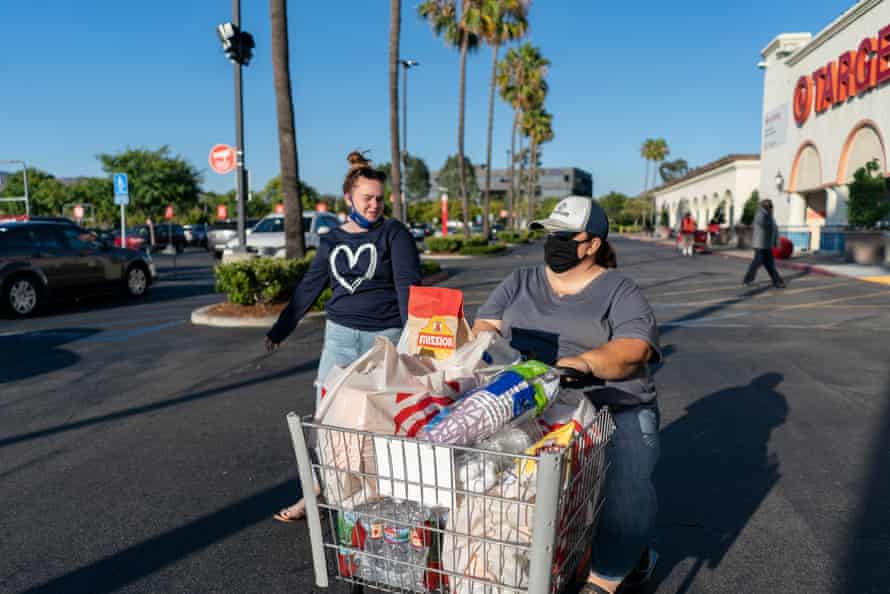 Sierra and Priscilla leave the grocery store. Orange County, California. July, 2020.