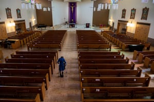 Sue Kenny walks into the St Ignatius Loyola Parish in Sacramento for prayer and quiet meditation