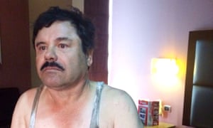 Joaquín ‘El Chapo’ Guzmán sits handcuffed on a bed in a the Doux motel as police await for reinforcements.