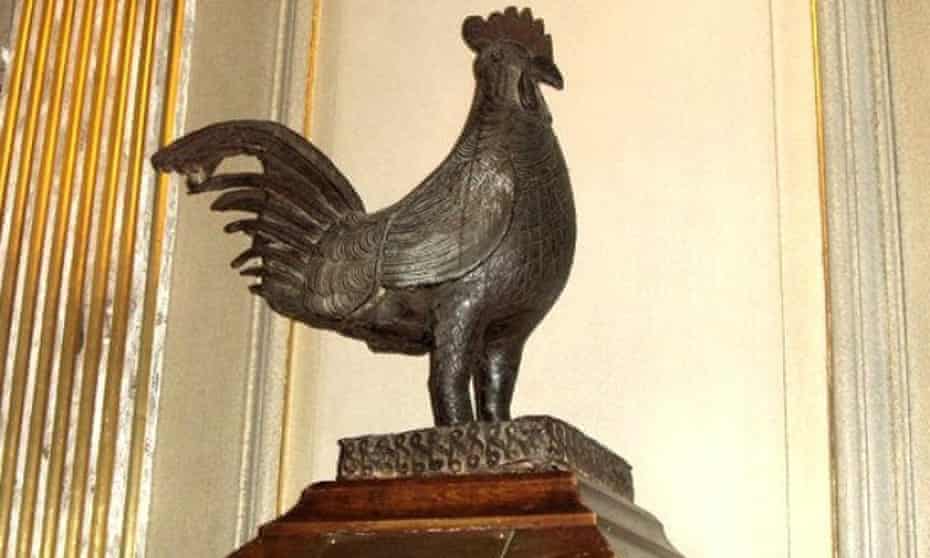 Bronze cockerel statue on display