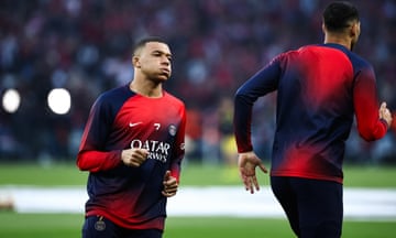 Kylian Mbappe warms up ahead of kick-off against Dortmund at the Parc des Prines.