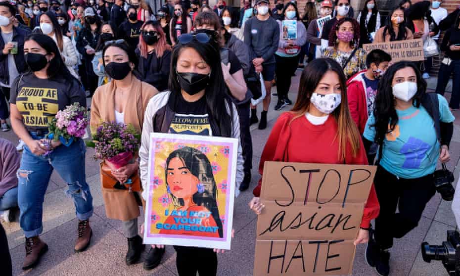 Demonstrators take part in a rally to raise awareness of anti-Asian violence in Los Angeles on 13 March. 