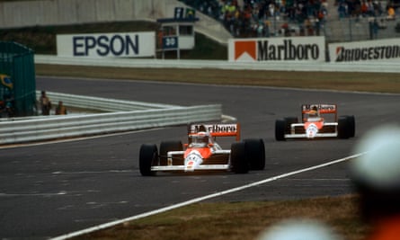 Alain Prost and Ayrton Senna go head to head during 1988’s Japanese Grand Prix at Suzuka.