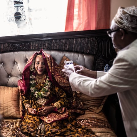 Badaant el Mounyrou, wearing full wedding attire, waits in the marital bedroom for the arrival of the groom