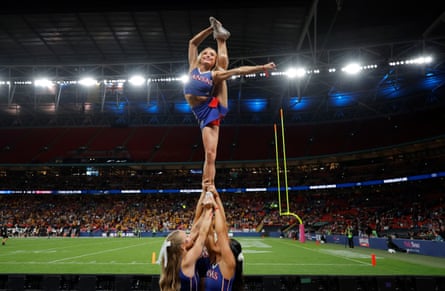 Cheerleaders supporting Kansas.