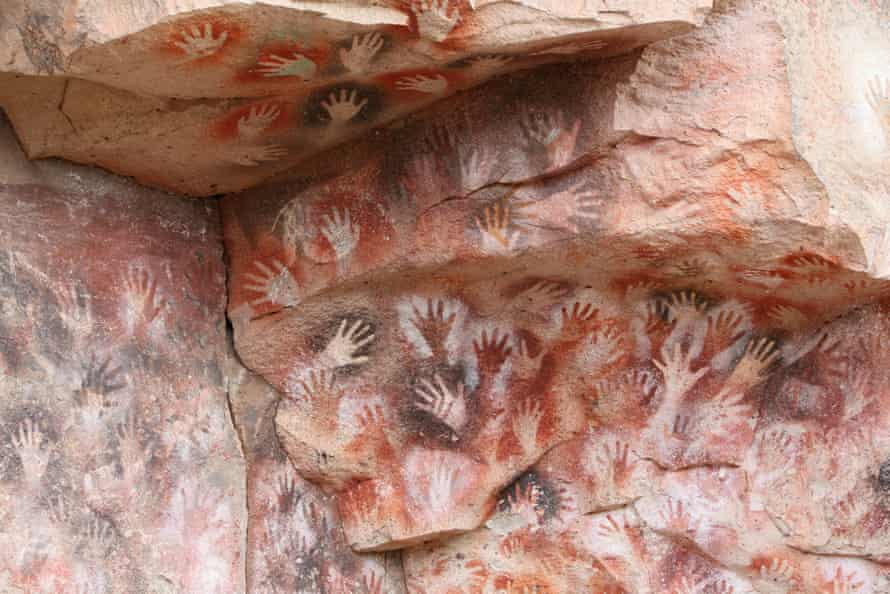 Cave hand paintings, dated to around 550 BC. Cueva de los Manos, Argentina.