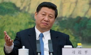 Xi Jinping attends a meeting with foreign experts at the Great Hall of the People in Beijing.