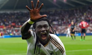 Bafétimbi Gomis celebrates after scoring Swansea’s decisive second goal.