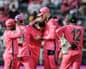 South Africa's Keshav Maharaj (centre) celebrates with teammates after dismissing Australia's Alex Carey in Johannesburg.