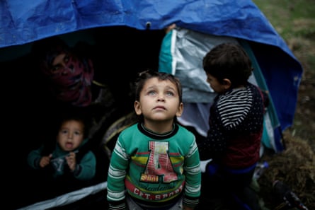A young Syrian refugee boy at a makeshift camp on Lesbos