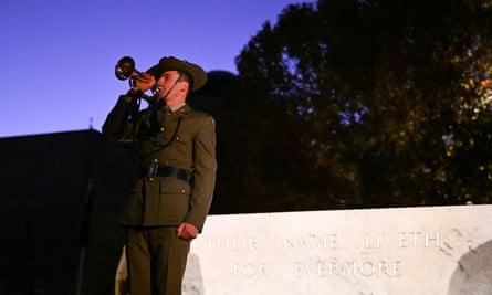 A bugler plays the last post at the Stone of Remembrance during Anzac Day commemorations at the Australian War Memorial, Canberra, Tuesday, 25 April, 2023.
