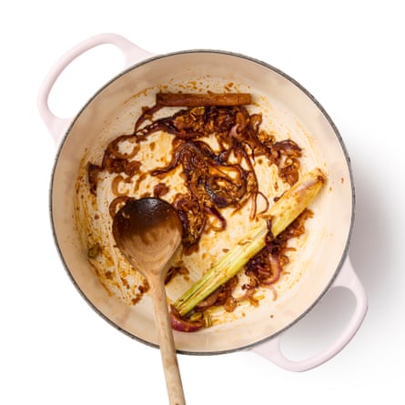 frying the onion for five or six minutes, until soft. Stir in the garlic, ginger, lemongrass, cardamom, cinnamon and chilli powder, frying for a minute or so.