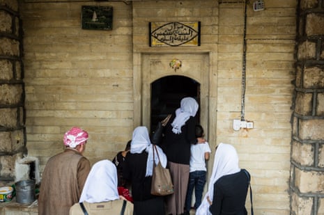 Women celebrating their return from Isis captivity in a new ritual at a shrine in Lalish, northern Iraq.