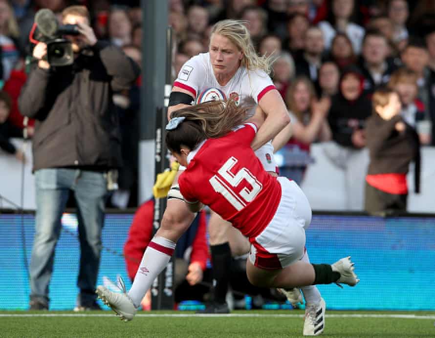 England's Alex Matthews knocks down Kayleigh Powell en route to scoring a try.
