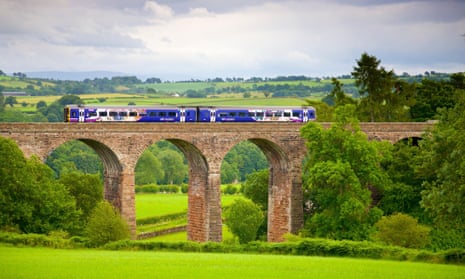 The Settle to Carlisle Railway Line. Sprinter passenger diesel train passing over Dry Beck Viaduct, Eden Valley, Cumbria, England.