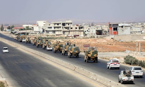 Turkish forces in a convoy on a main highway in Idlib province.
