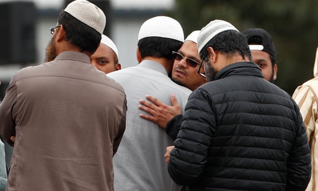 People attend the burial ceremony of the victims of the mosque attacks in Christchurch on Thursday.