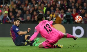 Barcelona’s Luis Suarez scores their first goal.