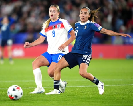 Lexi Potter (left) and Eleni Saich battle for the ball during the Women's World Cup qualifying playoff between England and Greece.