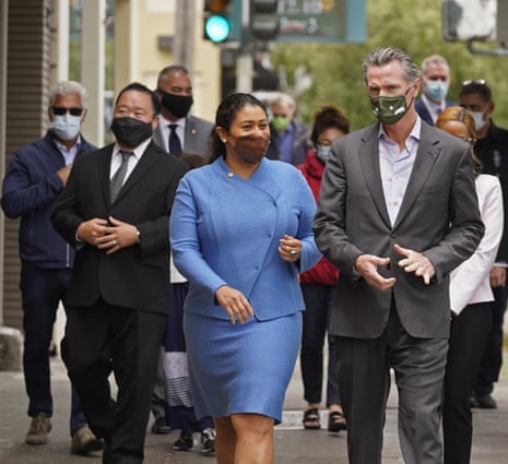 California governor Gavin Newsom with San Francisco Mayor London Breed walking to a news conference.