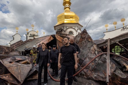 Zelenskiy, Svyrydenko and a third person at the damaged cathedral