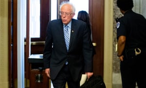 Senator Bernie Sanders arrives before votes in the Senate, in Washington on Wednesday. Sanders denied reports that he would suspend his presidential campaign.