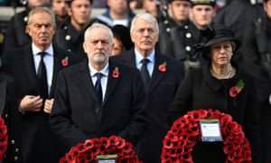 Jeremy Corbyn stands next to Theresa May, with former prime ministers Tony Blair (left) and Sir John Major, standing behind them
