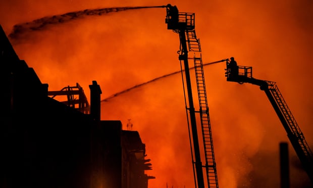 Firefighters tackle the blaze at its height on Friday night.