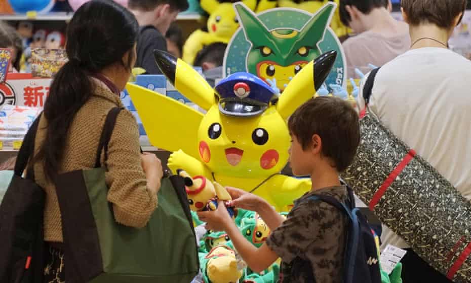 Customers visit a shop selling Pokemon goods in Tokyo.