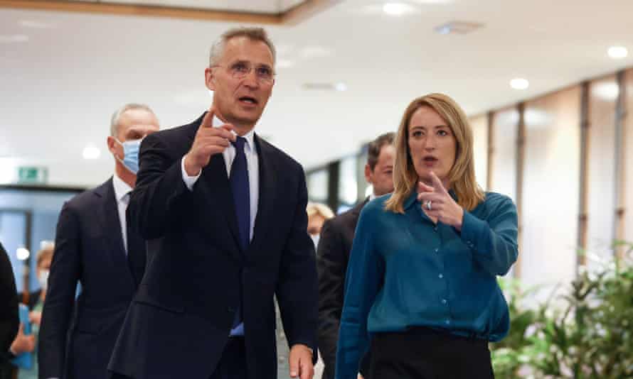 European parliament president Roberta Metsola (R) welcomes Nato secretary general Jens Stoltenberg at the European parliament in Brussels.