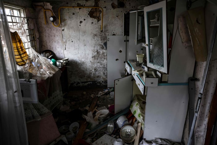 The interior of a destroyed house in the village of Lukianivka.
