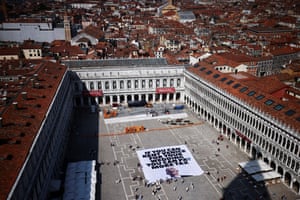 aerial view of banner reading 'if you can rent venice for your wedding you can pay more tax'