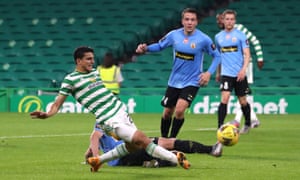 Mohamed Elyounoussi slides in to score Celtic’s sixth goal of the game in stoppage time.