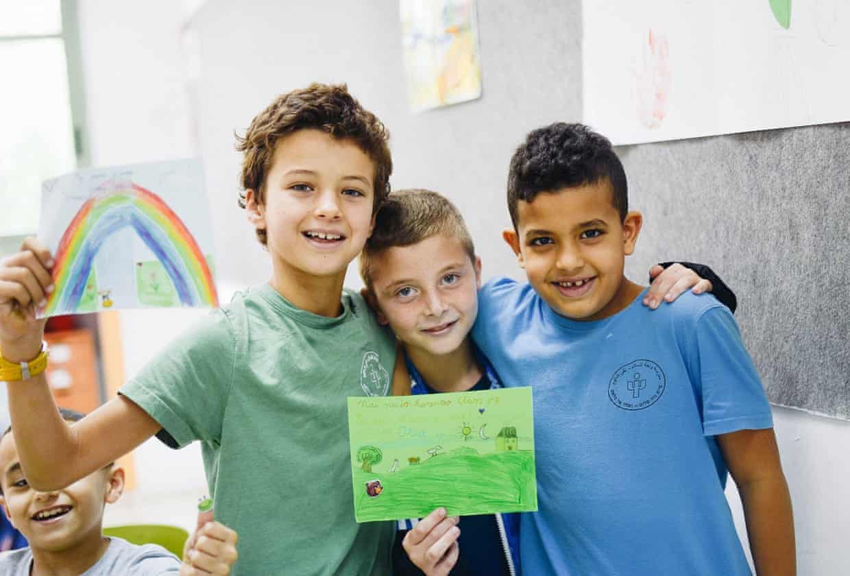 Village where Israelis and Palestinians live together to promote peace faces planned tax on funds