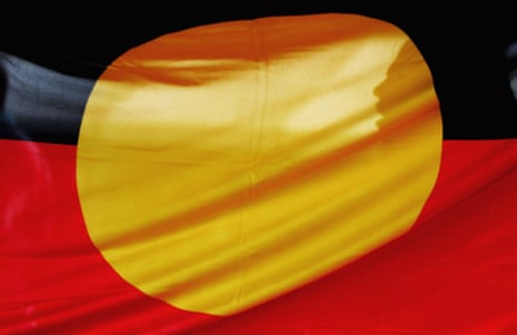 Aboriginal flag with a woman's face in silhouette