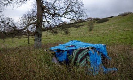 Abandoned camping equipment in a field near Glastonbury, Somerset.