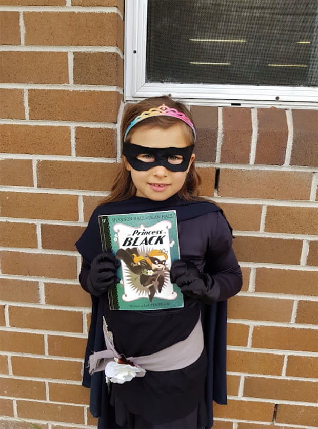 The princess in black simply wears black, a mask and a cape.