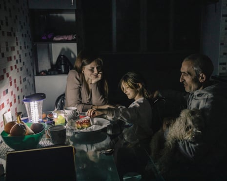 Maksym Kuliev and Anna Kulieva, along with their 7-year-old daughter Yeseniia, live with LED lights and head torches.