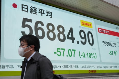 An electronic stock board showing Japan's Nikkei index at a securities firm today