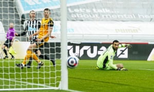 Miguel Almiron of Newcastle United has a shot at goal which hits the post.